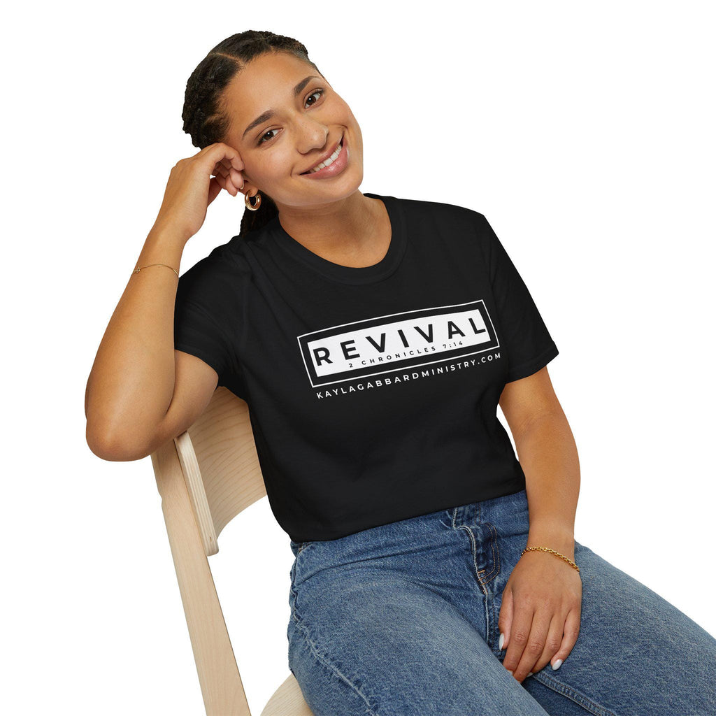May include: A black t-shirt with a white box that says 'REVIVAL 2 CHRONICLES 7:14 KAYLAGABBARDMNISTRY.COM'.