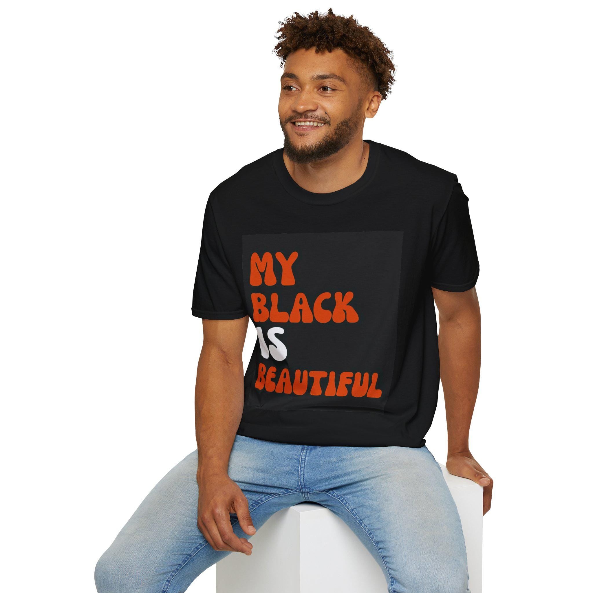 May include: A black t-shirt with the text 'My Black is Beautiful' in orange and white lettering.
